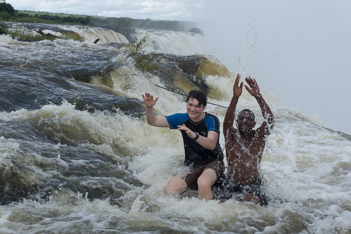 Sitting at the edge of Victoria Falls