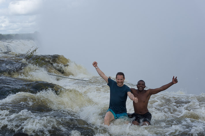 Sitting at the edge of Victoria Falls