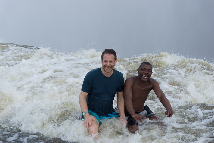 Sitting at the edge of Victoria Falls