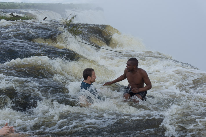 Sitting at the edge of Victoria Falls