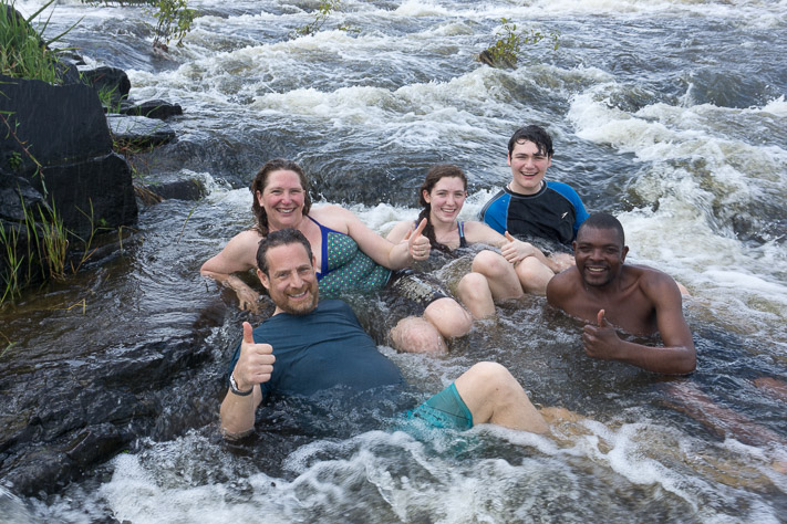 Sitting at the edge of Victoria Falls
